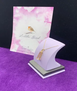 14KT YG Fancy Cut White Topaz necklace.