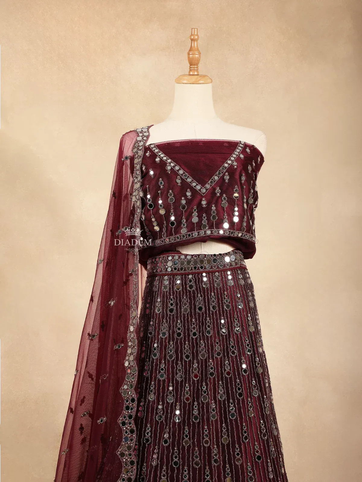 Burgundy Raw Silk Semi-Stitched Lehenga Embellished with Mirrorwork Paired with Net Dupatta