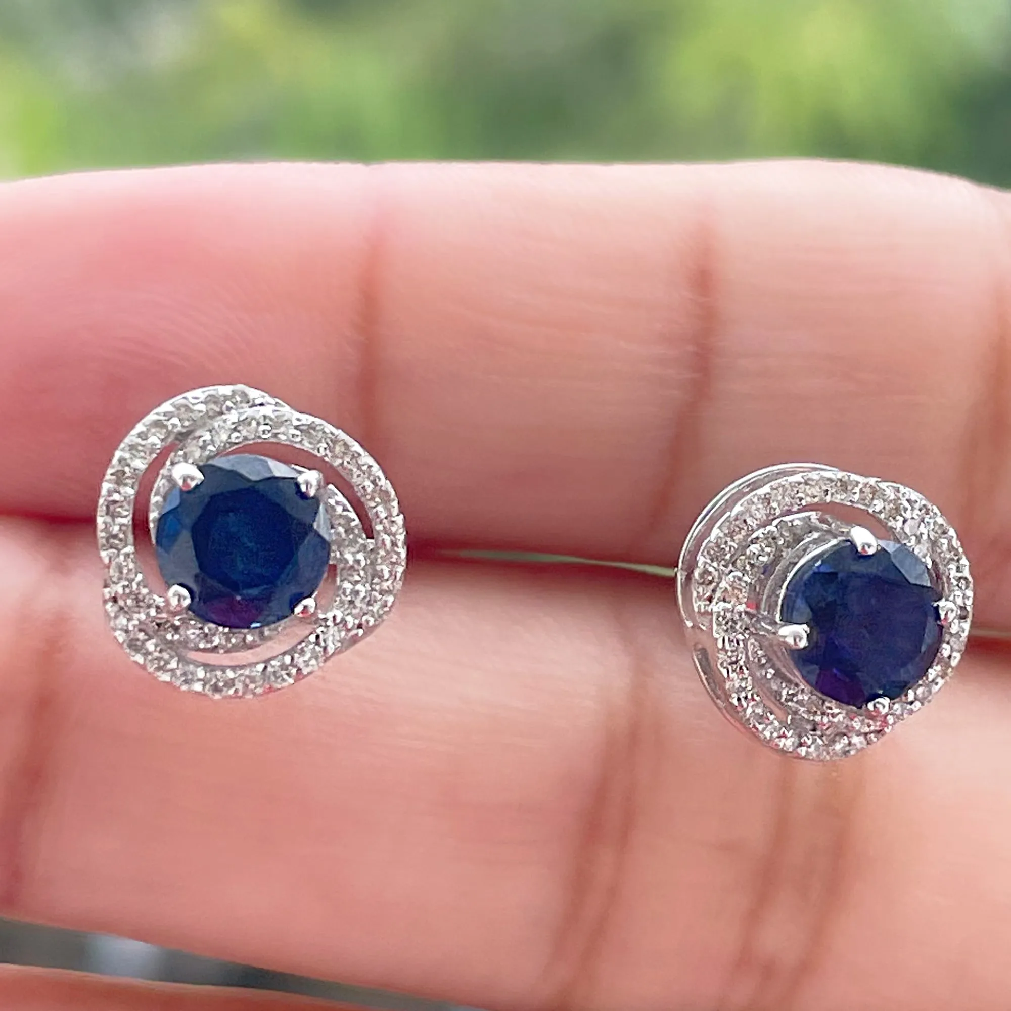 Created Blue Sapphire and Diamond Swirl Stud Earrings