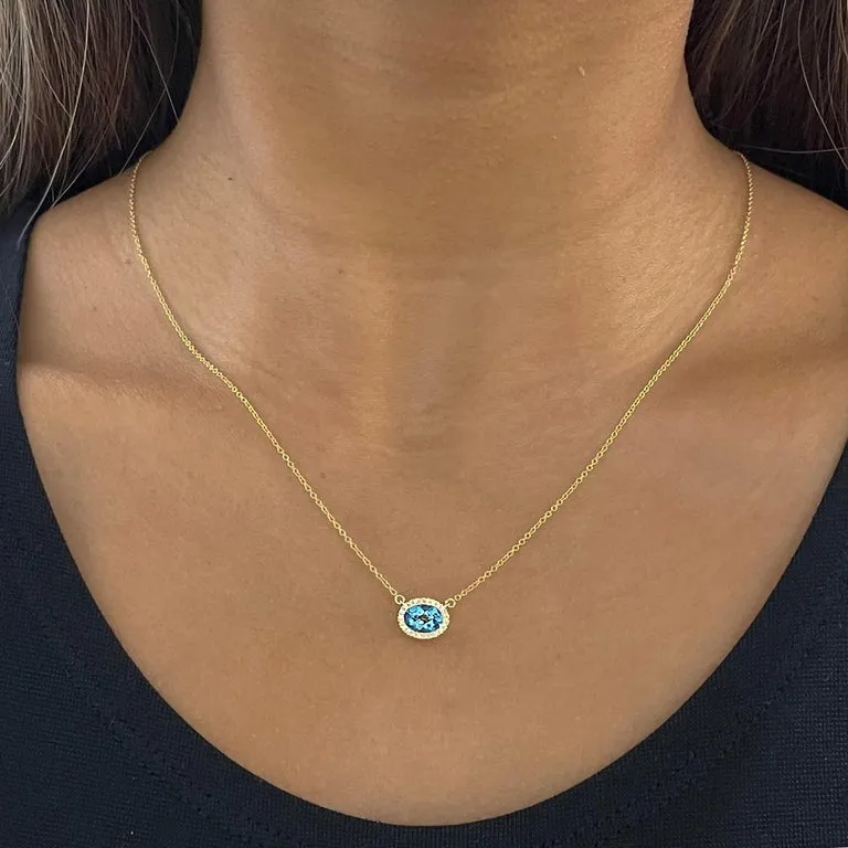 Horizontal Oval Blue Topaz and Diamond Halo Necklace