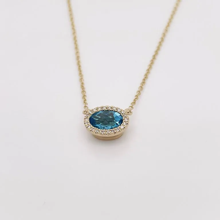 Horizontal Oval Blue Topaz and Diamond Halo Necklace