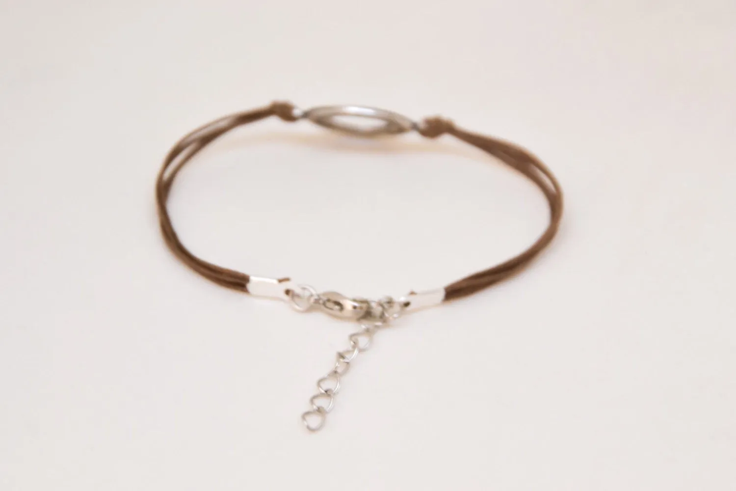 Life is what you make of it' charm bracelet, brown cord, silver circle