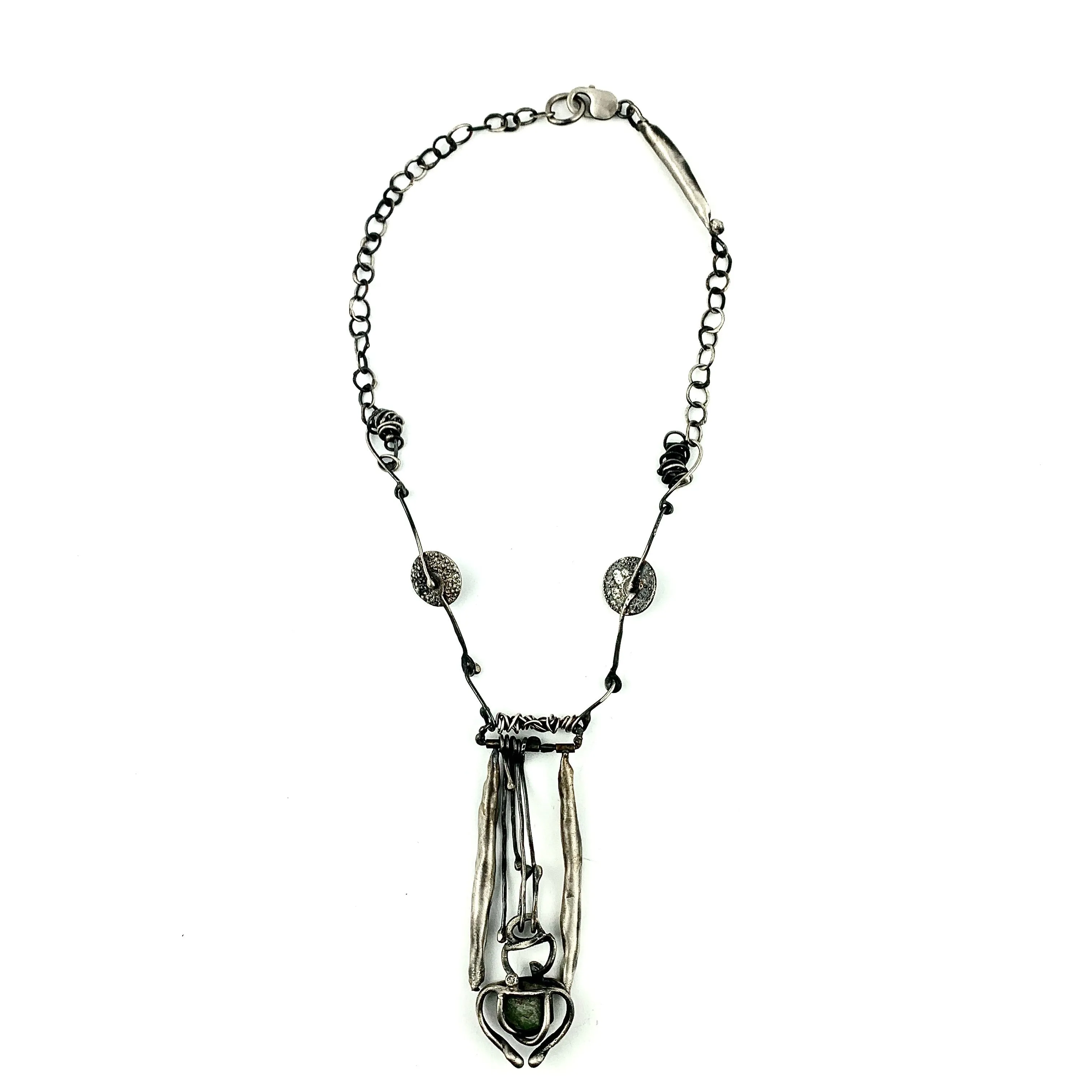 Sculptural Necklace with Blue Topaz and Caged Green Rough Stone